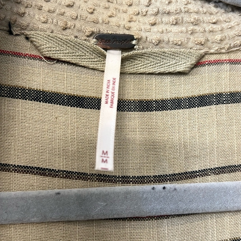 Free People “quite the look over shirt”. Long sleeve and button up front.
